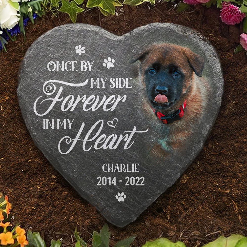 Heart-shaped pet memorial stone with a dog's photo and 'Forever in my Heart' inscription; a lasting memorial.